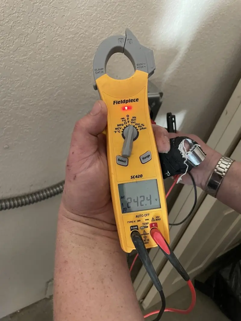 Voltage testing with clamp meter during Generator Installation in Augusta